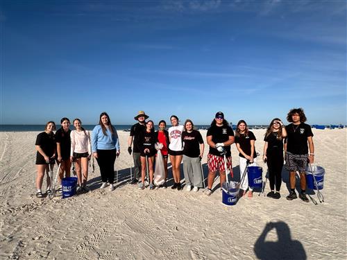 Student Volunteers clean up beach